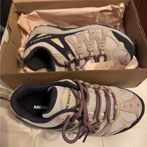 Merrell Tan and Black Trail Shoes. Size 6.5. Never worn. Ran a bit small for me.